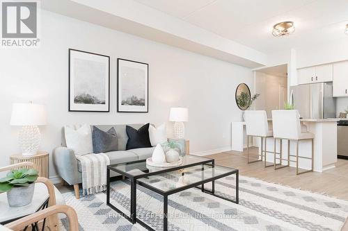 110 - 640 Sauve Street S, Milton, ON - Indoor Photo Showing Living Room