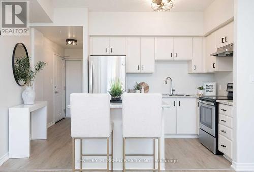 110 - 640 Sauve Street S, Milton, ON - Indoor Photo Showing Kitchen With Upgraded Kitchen