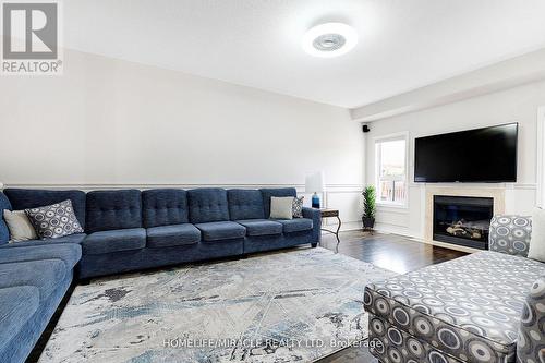 46 Amboise Crescent, Brampton, ON - Indoor Photo Showing Living Room With Fireplace