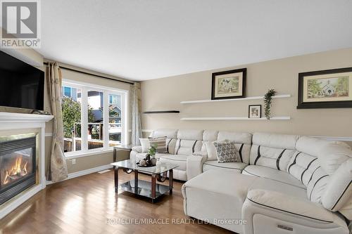 462 Citadel Crescent E, Barrhaven, ON - Indoor Photo Showing Living Room With Fireplace