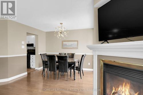 462 Citadel Crescent E, Barrhaven, ON - Indoor Photo Showing Dining Room With Fireplace