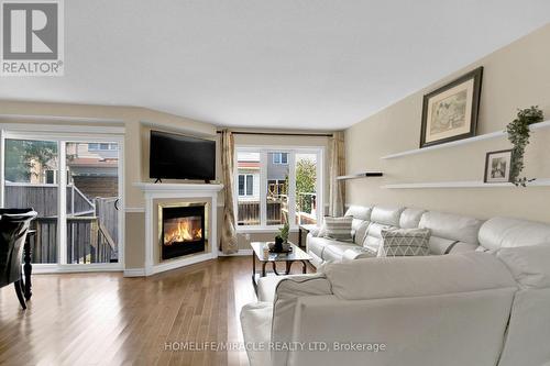 462 Citadel Crescent E, Barrhaven, ON - Indoor Photo Showing Living Room With Fireplace