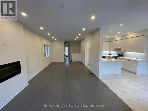 3950 Thomas Alton Boulevard, Burlington, ON - Indoor Photo Showing Other Room With Fireplace