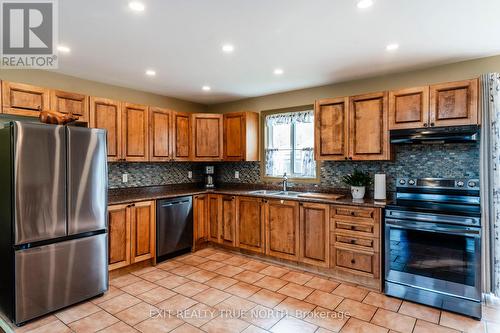 24 Wakunda Crescent, Tiny, ON - Indoor Photo Showing Kitchen With Double Sink