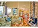 6838 Santiago Loop Unit# 176, Kelowna, BC  - Indoor Photo Showing Living Room With Fireplace 