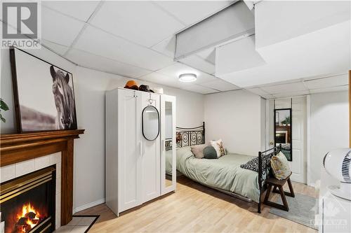 120 Whalings Circle, Ottawa, ON - Indoor Photo Showing Bedroom With Fireplace