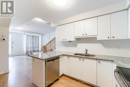 1 - 26 Humberwood Boulevard, Toronto, ON - Indoor Photo Showing Kitchen With Double Sink