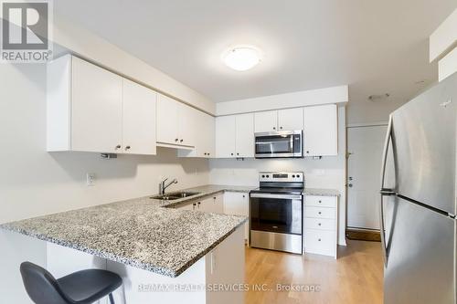 1 - 26 Humberwood Boulevard, Toronto, ON - Indoor Photo Showing Kitchen With Stainless Steel Kitchen With Double Sink With Upgraded Kitchen