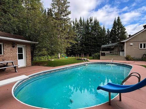 Pool - 22 Mtée Manory, Sainte-Marguerite-Du-Lac-Masson, QC - Outdoor With In Ground Pool With Backyard