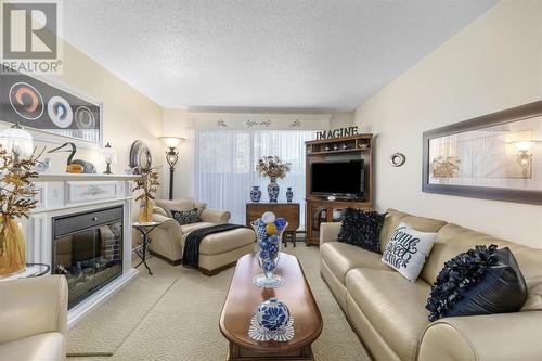 89 Pine St, Sault Ste. Marie, ON - Indoor Photo Showing Living Room With Fireplace