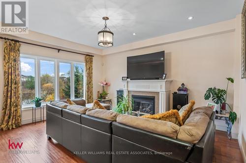 691 Robert Ferrie Drive, Kitchener, ON - Indoor Photo Showing Living Room With Fireplace