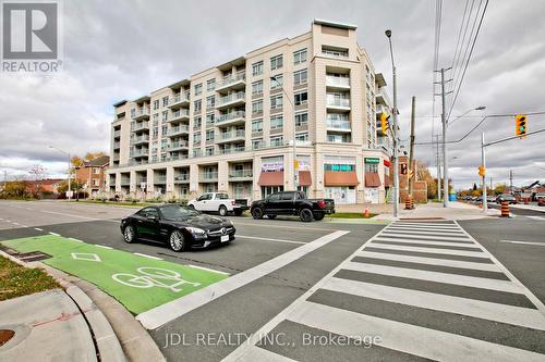 715 - 4600 Steeles Avenue E, Markham, ON - Outdoor With Balcony With Facade