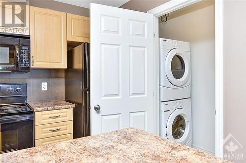 Kitchen view of Laundry area - 139 Harthill Way Unit#B, Ottawa, ON - Indoor Photo Showing Laundry Room