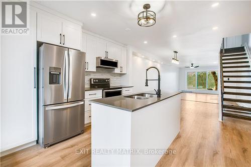 14 - 2890 Presqu'Ile Road, Alfred And Plantagenet, ON - Indoor Photo Showing Kitchen With Double Sink With Upgraded Kitchen