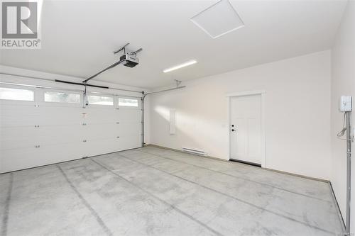 1824 Crown Isle Blvd, Courtenay, BC - Indoor Photo Showing Garage