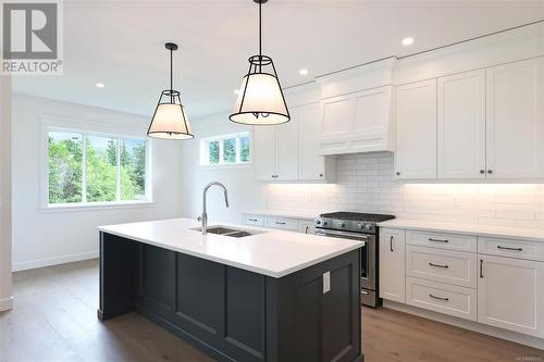 1824 Crown Isle Blvd, Courtenay, BC - Indoor Photo Showing Kitchen With Double Sink With Upgraded Kitchen