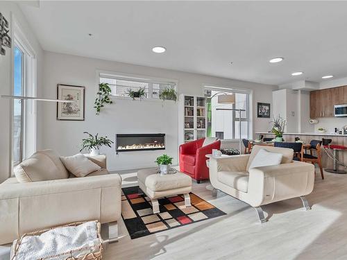 407-842 Orono Ave, Langford, BC - Indoor Photo Showing Living Room With Fireplace