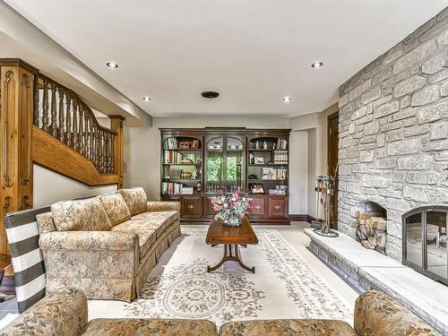 Family room - 279 Ch. Du Colibri, Ivry-Sur-Le-Lac, QC - Indoor Photo Showing Living Room With Fireplace