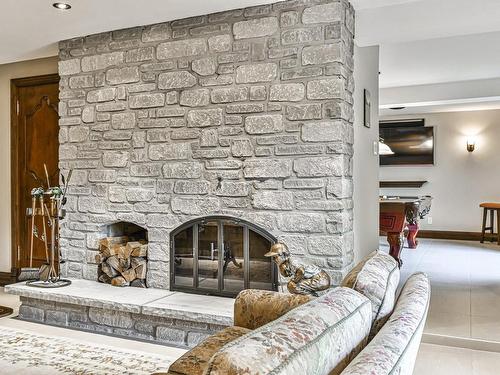 Family room - 279 Ch. Du Colibri, Ivry-Sur-Le-Lac, QC - Indoor Photo Showing Living Room With Fireplace