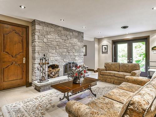 Family room - 279 Ch. Du Colibri, Ivry-Sur-Le-Lac, QC - Indoor Photo Showing Living Room With Fireplace