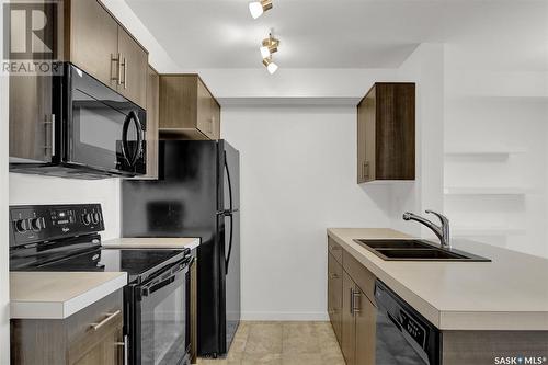 1314 5500 Mitchinson Way, Regina, SK - Indoor Photo Showing Kitchen With Double Sink