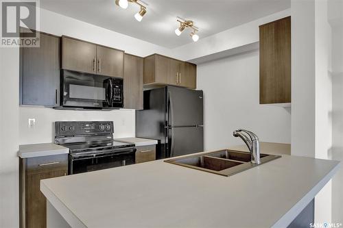 1314 5500 Mitchinson Way, Regina, SK - Indoor Photo Showing Kitchen With Double Sink