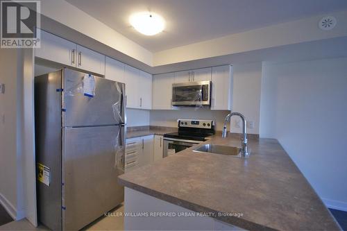 218 - 10 Dunsheath Way, Markham, ON - Indoor Photo Showing Kitchen With Stainless Steel Kitchen