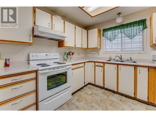 2806 35 Street Unit# 102, Vernon, BC - Indoor Photo Showing Kitchen With Double Sink