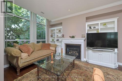 110 - 4 Briar Hill Heights, New Tecumseth, ON - Indoor Photo Showing Living Room With Fireplace