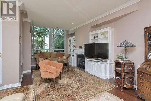 110 - 4 Briar Hill Heights, New Tecumseth, ON - Indoor Photo Showing Living Room With Fireplace