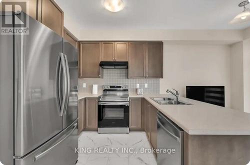 47 Eva Drive, Woolwich, ON - Indoor Photo Showing Kitchen With Stainless Steel Kitchen With Double Sink