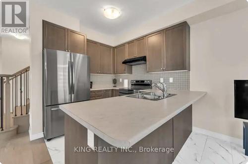 47 Eva Drive, Woolwich, ON - Indoor Photo Showing Kitchen With Stainless Steel Kitchen With Double Sink