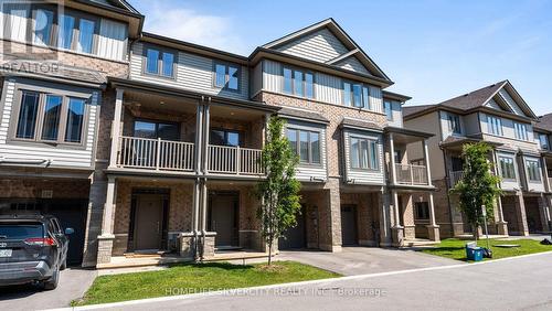 #113 - 77 Diana Avenue, Brantford, ON - Outdoor With Balcony With Facade