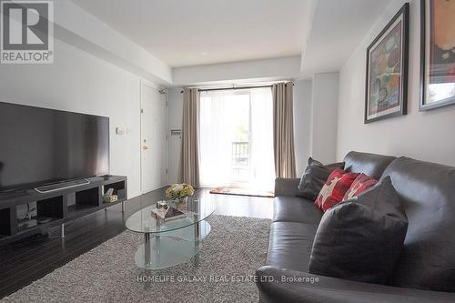 2049 - 3033 Finch Avenue W, Toronto, ON - Indoor Photo Showing Living Room