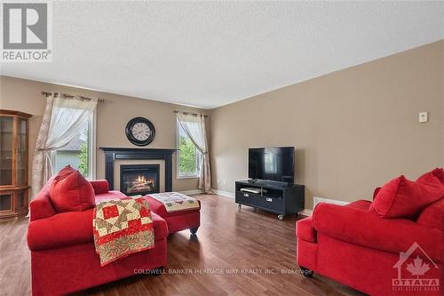 412 Van Dusen Street, Mississippi Mills, ON - Indoor Photo Showing Living Room With Fireplace