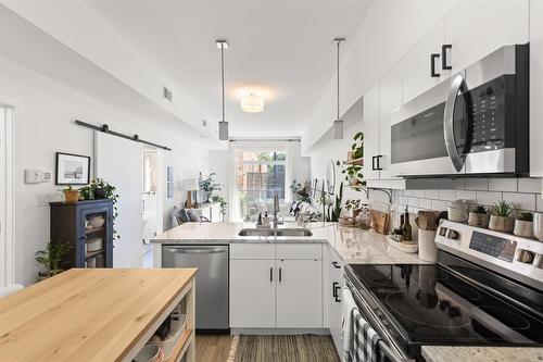 209 247 River Avenue, Winnipeg, MB - Indoor Photo Showing Kitchen With Double Sink With Upgraded Kitchen