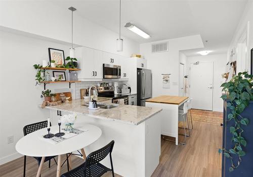 209 247 River Avenue, Winnipeg, MB - Indoor Photo Showing Kitchen With Upgraded Kitchen