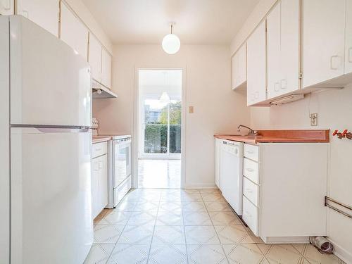 Cuisine - 39-1800 Place Dunant, Saint-Bruno-De-Montarville, QC - Indoor Photo Showing Kitchen