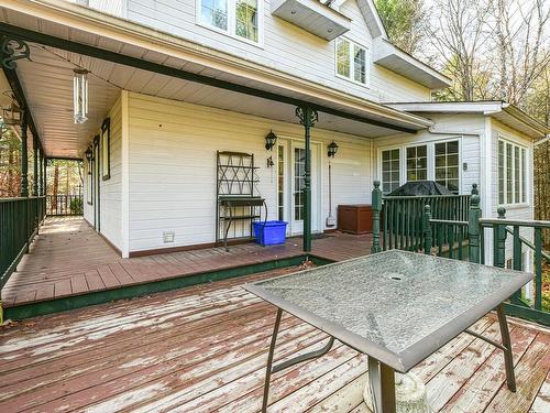 Back facade - 102 Rue Des Primeroses, Saint-Colomban, QC - Outdoor With Deck Patio Veranda With Exterior