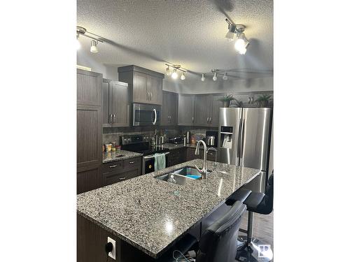 1105 33A St Nw, Edmonton, AB - Indoor Photo Showing Kitchen With Double Sink With Upgraded Kitchen