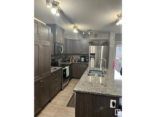 1105 33A St Nw, Edmonton, AB - Indoor Photo Showing Kitchen With Double Sink With Upgraded Kitchen