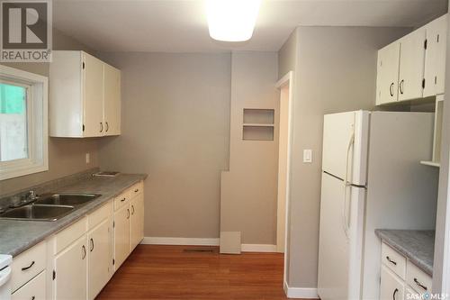 107 James Street, Saskatoon, SK - Indoor Photo Showing Kitchen With Double Sink