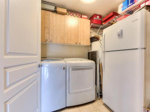 Salle de lavage - R-04-4625 Av. Félix-Leclerc, Montréal (Saint-Laurent), QC - Indoor Photo Showing Laundry Room