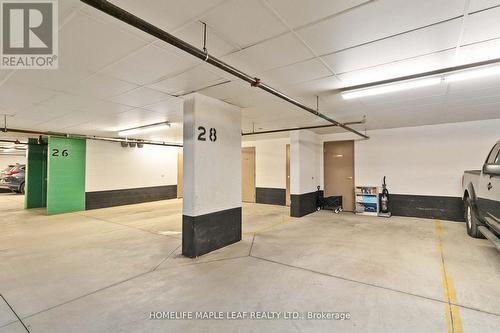 206 - 65 Via Rosedale Way, Brampton, ON - Indoor Photo Showing Garage