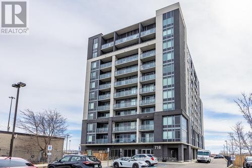 402 - 716 Main Street E, Milton, ON - Outdoor With Balcony With Facade