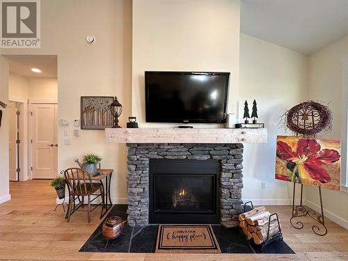 1881 Foxwood Trail, Windermere, BC - Indoor Photo Showing Living Room With Fireplace