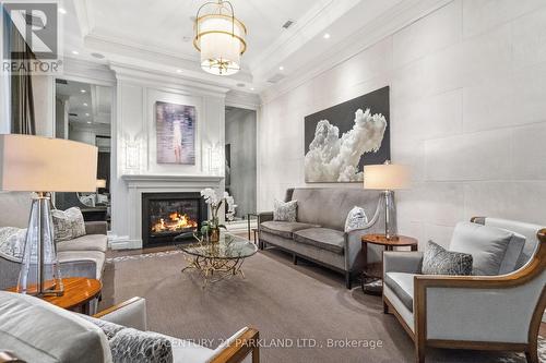 409 - 155 St Clair Avenue W, Toronto, ON - Indoor Photo Showing Living Room With Fireplace