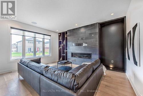 Pictures are from previously finished Model Home. - 2622 Heardcreek Trail, London, ON - Indoor Photo Showing Living Room With Fireplace