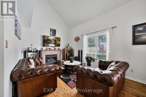 9 Tom Edwards Drive, Whitby, ON - Indoor Photo Showing Living Room With Fireplace