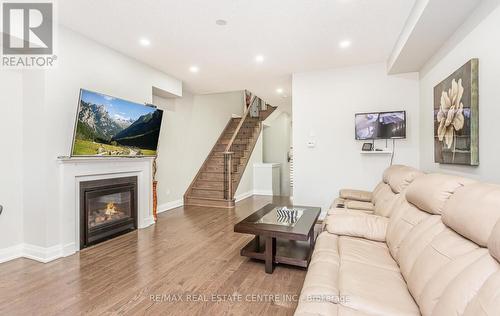 3 Dalbeattie Drive, Brampton, ON - Indoor Photo Showing Living Room With Fireplace